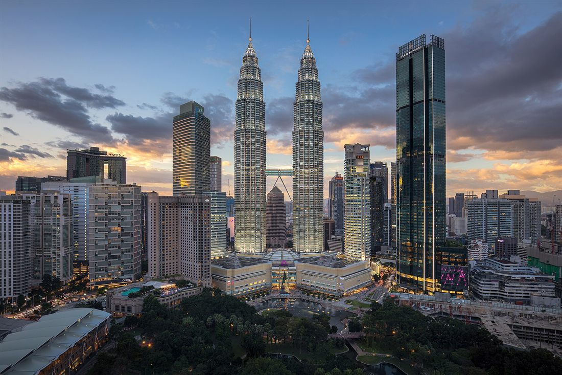 Kuala Lumpur skyline at dusk with the Petronas Towers