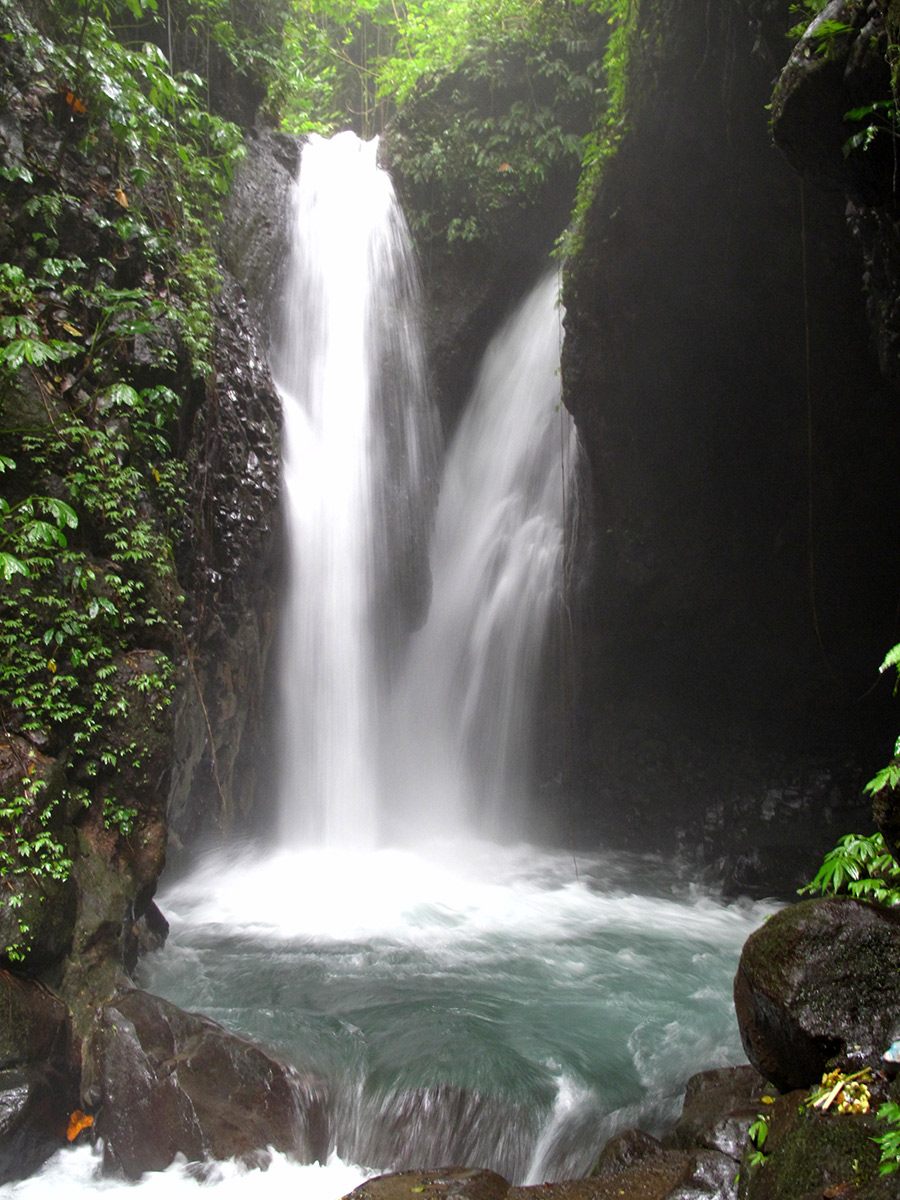 Git-Git waterfall falling through jungle in Bali